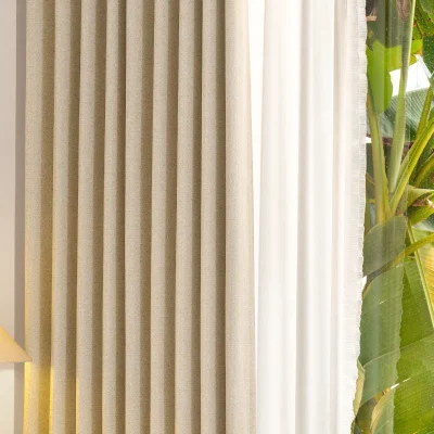 Beige high-precision curtain paired with green balcony view, showcasing natural light and elegant drape
