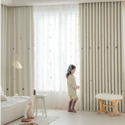 Full view of Starry Weave Curtain installed in a child’s room with embroidered star design and light-filtering fabric