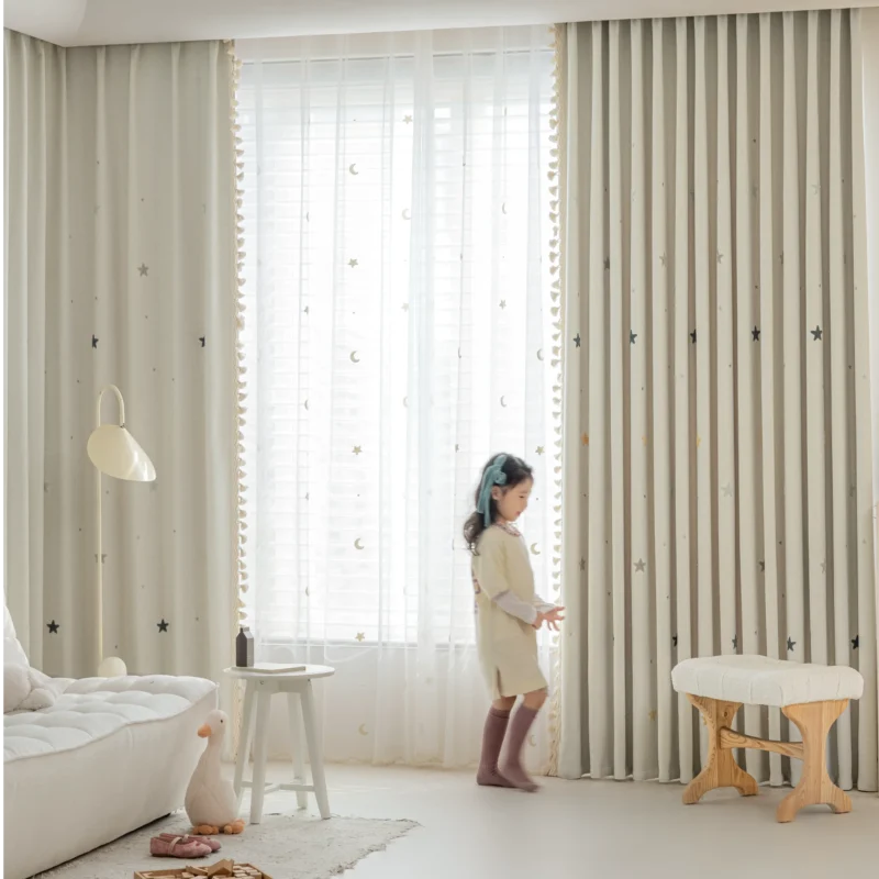 Full view of Starry Weave Curtain installed in a child’s room with embroidered star design and light-filtering fabric