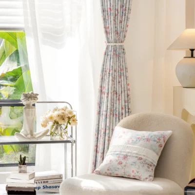 Bird and floral curtain styled in a bright vintage room with natural light and pastel accents