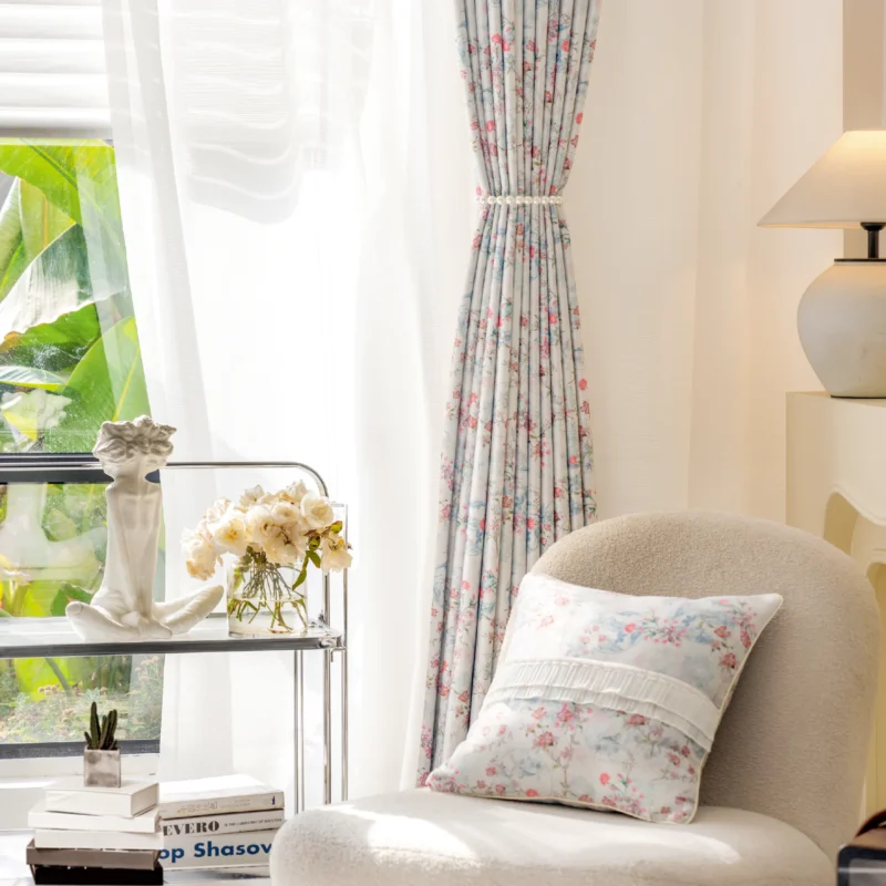 Bird and floral curtain styled in a bright vintage room with natural light and pastel accents