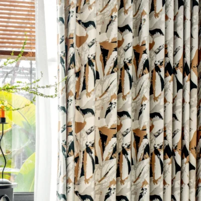 Close-up view of Painter’s Bloom curtain with bold abstract floral print near a sunny window.