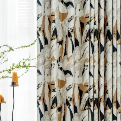 Painter’s Bloom curtain fabric close-up with abstract floral print and candle decor.