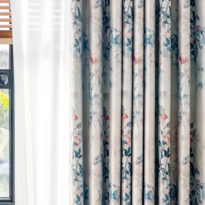 Close-up of Dreamy Meadow floral curtains softly draping by the window, showcasing elegant watercolor pattern and light filtering quality
