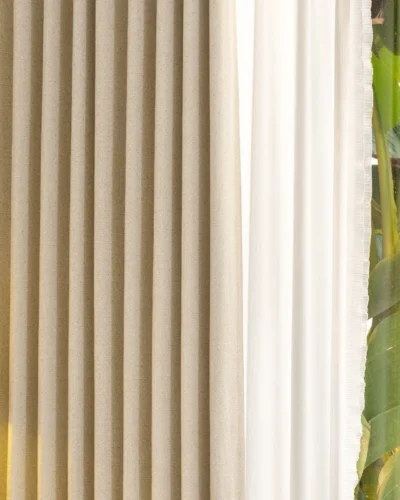 Close-up of Sierra Weave high-density curtain fabric with soft glow texture