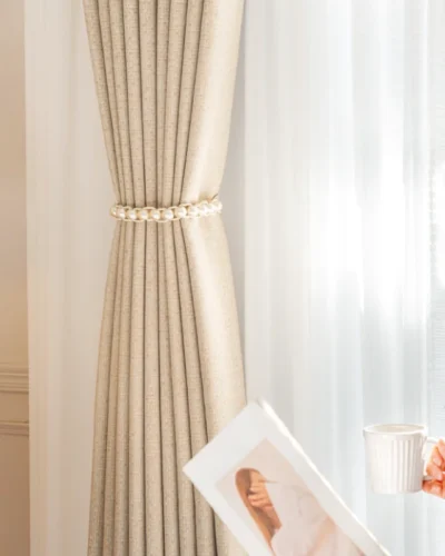 Sierra Weave curtain KDL-J111-6 softly tied back in natural light, highlighting high-density texture and soft glow