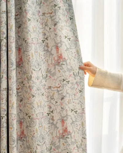 Person holding fairy tale garden curtain to show pastel storybook print for kids