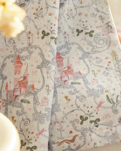Fairy tale curtain close-up with castle and storybook botanical prints for kids