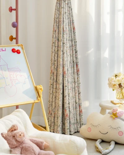 Fairy tale curtain with storybook castle print in a cozy children's room with toys and sunlight
