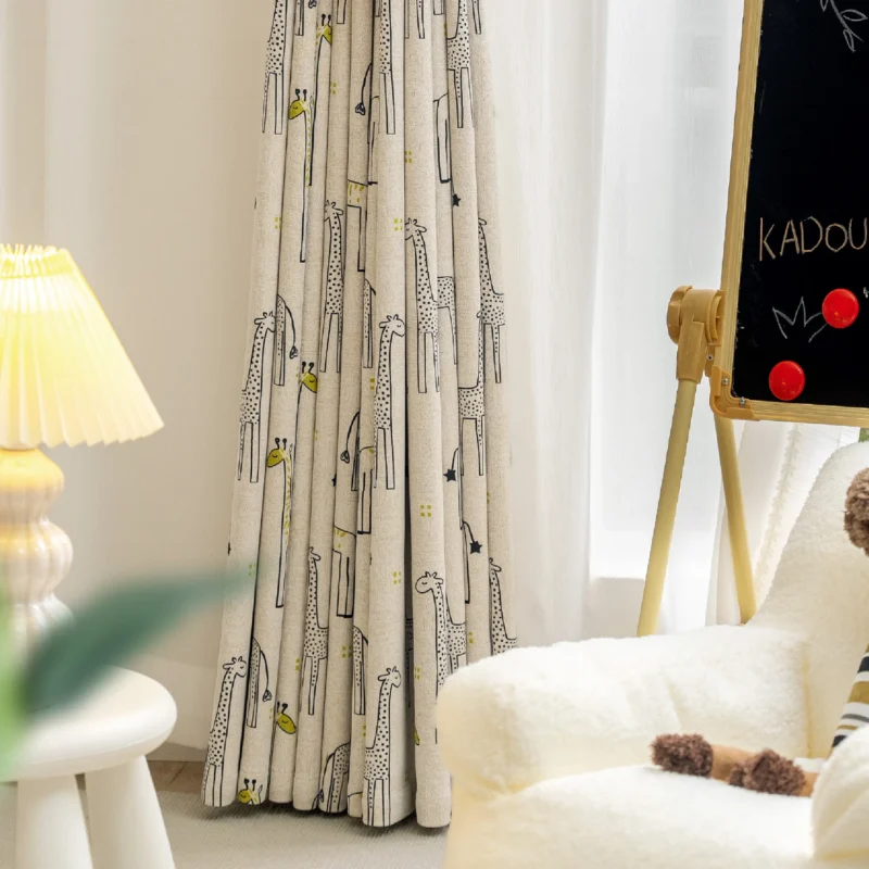Children’s room with giraffe print curtains, cozy decor, and natural light