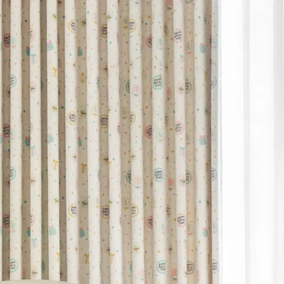 Party print curtain with pastel birthday motifs for kids’ room