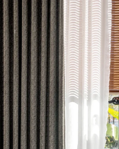 Charcoal brown curtain with subtle texture in minimalist living room – part of Ivory Breeze Collection