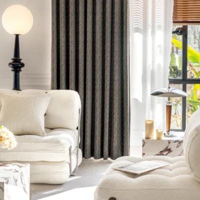 Charcoal grey curtain in modern living room, paired with light-colored furniture – Ivory Breeze Collection