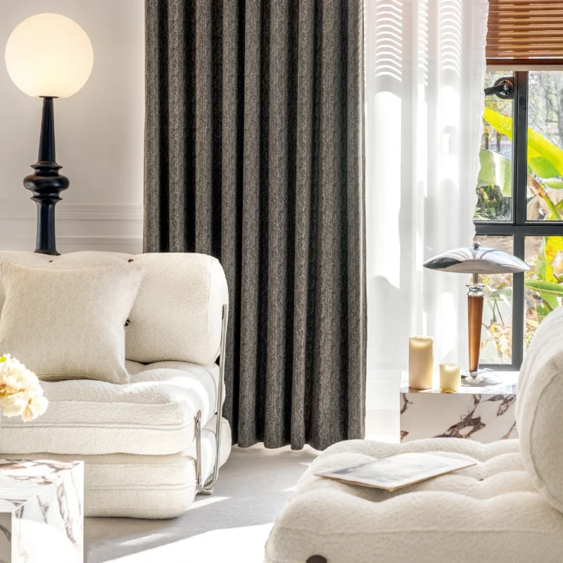 Charcoal grey curtain in modern living room, paired with light-colored furniture – Ivory Breeze Collection