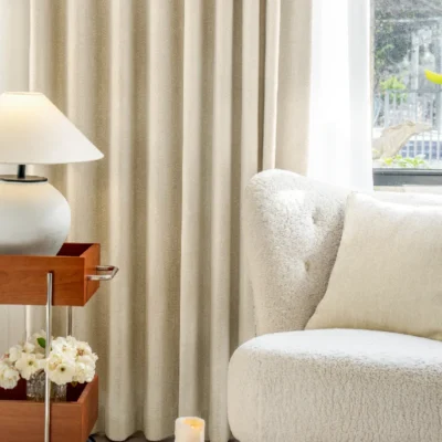 Herringbone curtain with pleats styled in a Japandi living room
