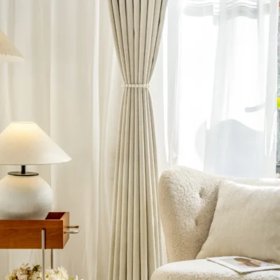 Minimalist herringbone curtain draped over window in serene interior