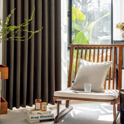 Earthline Curtain in charcoal brown displayed in a modern living space – textured woven drapes gently filtering light with nature-inspired elegance by Lemonhone.