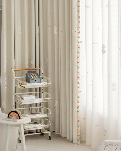 Lemonhone Friendly Pup Curtain in beige – embroidered jacquard drapes with pompom trim for kids’ spaces