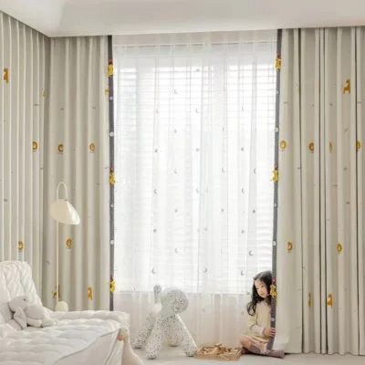 Measuring Forest King Curtain during installation – close-up of jacquard fabric and playful lion tieback