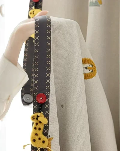 Measuring Forest King Curtain during installation – close-up of jacquard fabric and playful lion tieback