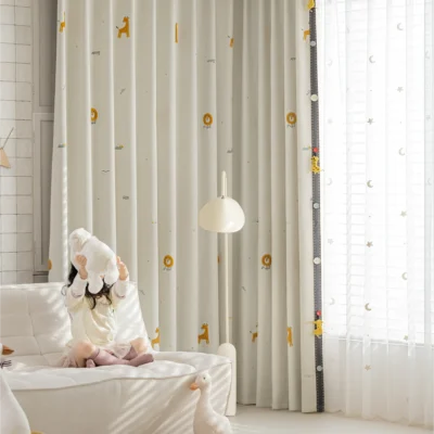 Forest King Curtain – embroidered lion motif on beige jacquard, styled in a cozy nursery with layered sheers
