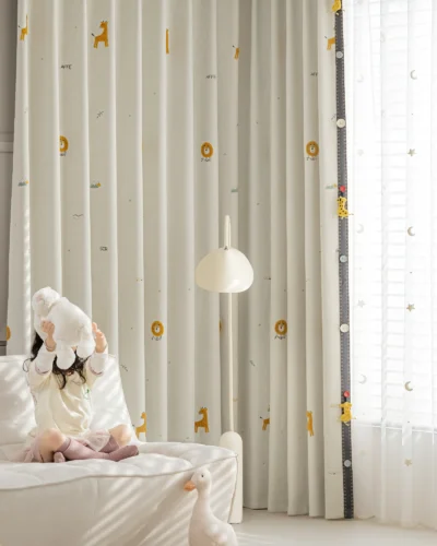 Forest King Curtain – embroidered lion motif on beige jacquard, styled in a cozy nursery with layered sheers
