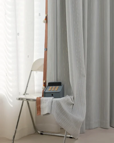 Minimal striped curtain in mist grey with soft vertical lines, ideal for cozy kids’ spaces