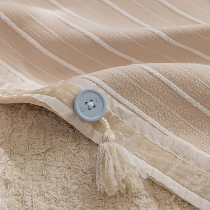 Close-up of Blush Sweet Curtain fabric showing striped jacquard texture with button detail.