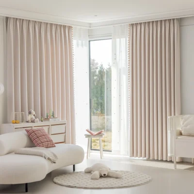 Soft mosaic jacquard curtain in pastel pink hanging in a cozy modern living room