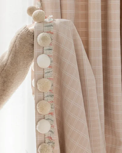 Close-up of Gridline Whisper Curtain showing woven grid texture and hook-style hanging