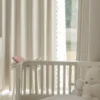 Sky Glaze Curtain in a soft modern room with light-filtering jacquard fabric and sheer layering