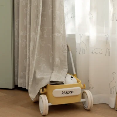 Forest Dream Curtain with animal jacquard fabric in kids’ room, styled beside a toy car – light-filtering and playful
