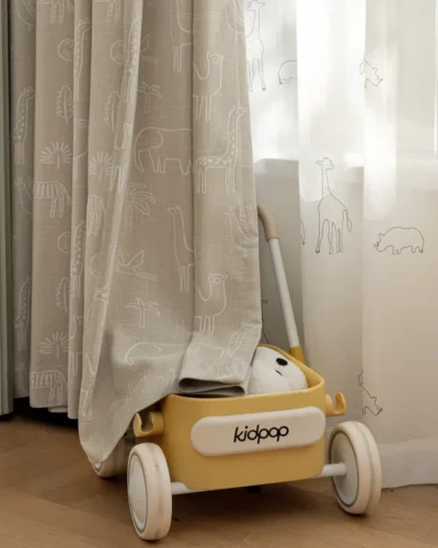 Forest Dream Curtain with animal jacquard fabric in kids’ room, styled beside a toy car – light-filtering and playful