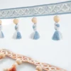 Norwegian Forest Wood Bead Tassel Trim on Linen Curtain