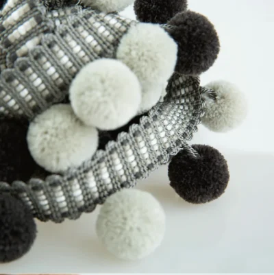 Monochrome black, white, and grey pom pom fringe trim for modern or minimalist home decor