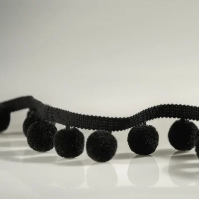 Serene Pom Fringe – soft black pom pom trim for curtains and cushions
