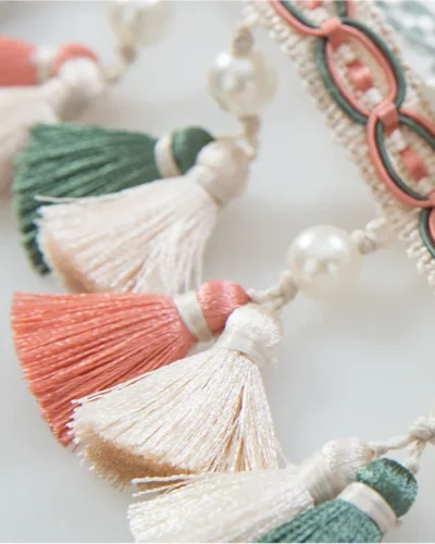 Annecy Tassel Curtain Trim in soft pastel tones with handcrafted detailing