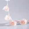 Nymph Garden lace curtain trim with delicate pink floral tassels for romantic interiors