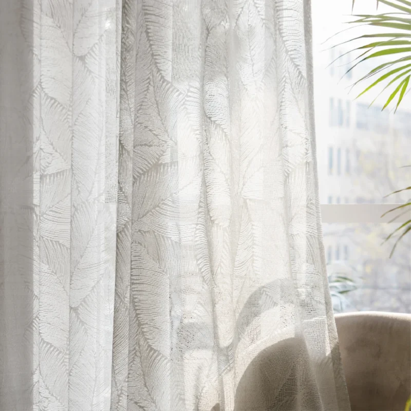 Botanic Veil Curtain filtering soft natural light with botanical patterns visible against an outdoor backdrop