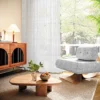Leaf texture sheer curtain in a modern living room, softly filtering sunlight beside a window with natural scenery