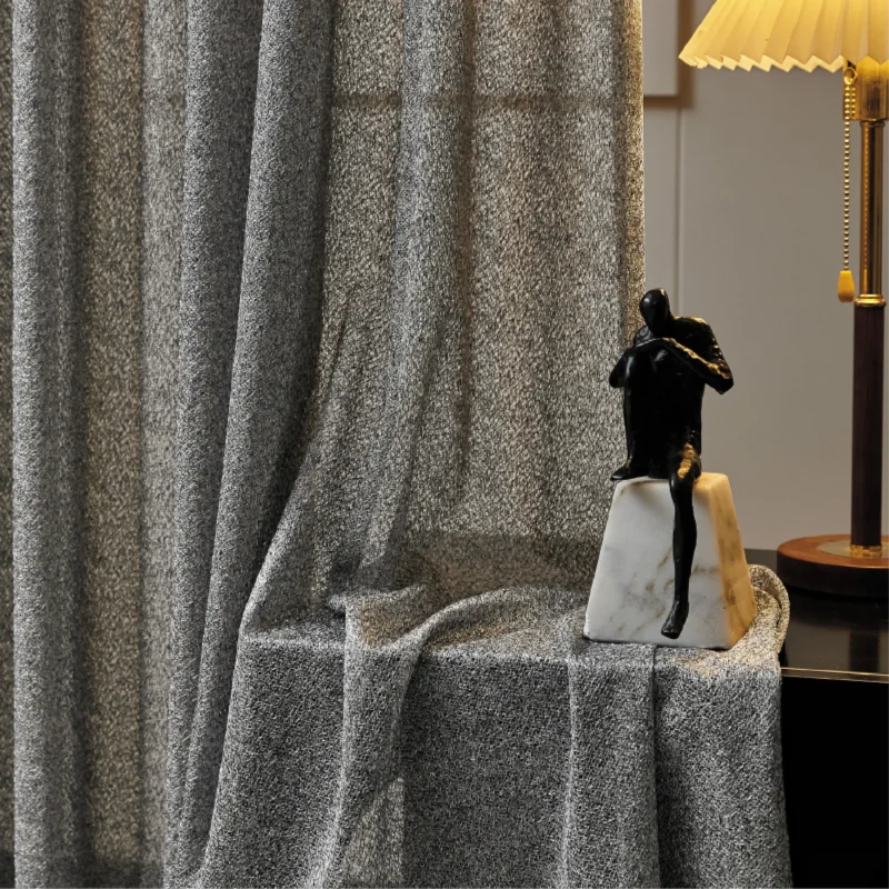 Ripple sheer curtain in modern interior, softly filtering light with elegant wave texture.