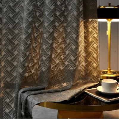Serene Weave Sheer Curtain in dark jacquard texture under warm lamp lighting