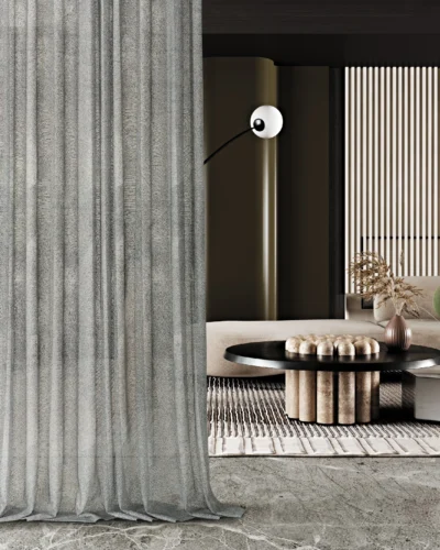 Ripple sheer curtain in modern living space with floor-to-ceiling installation and soft vertical folds.
