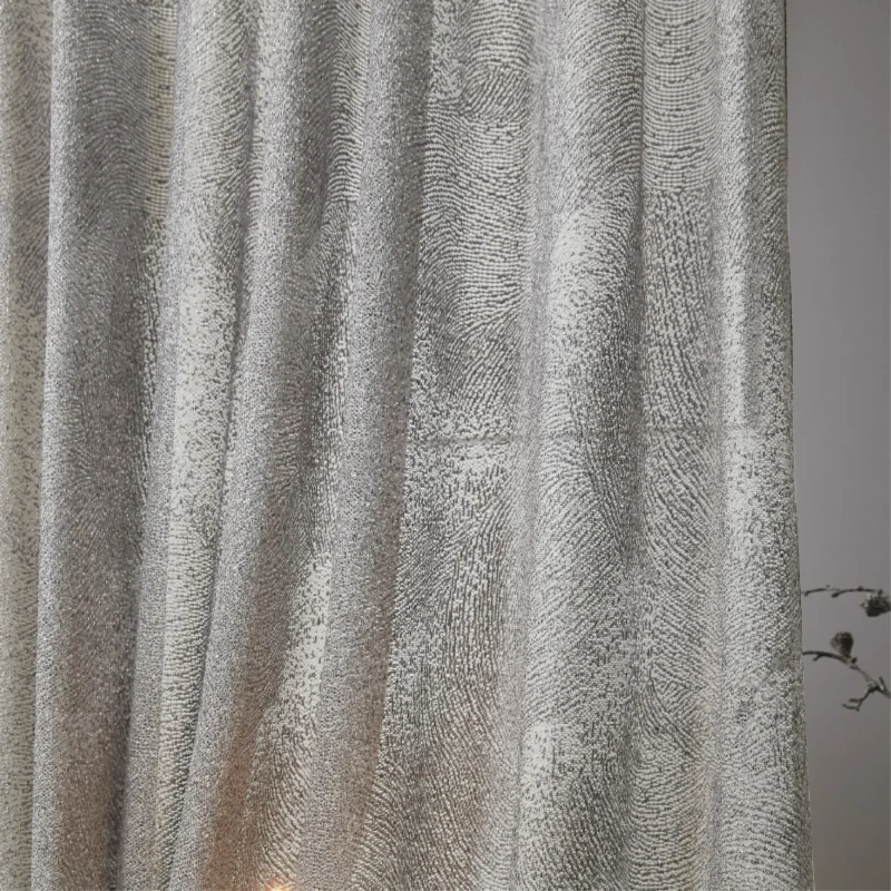 Ripple sheer curtain with subtle wave texture, softly flowing with natural light.