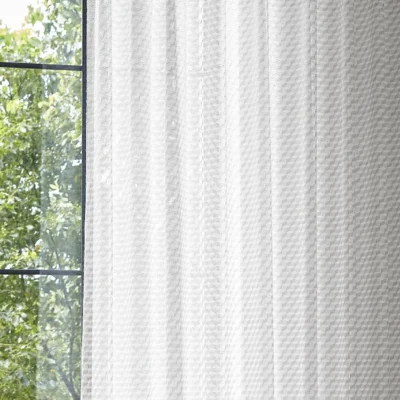 White geometric jacquard sheer curtain with soft light and tree view