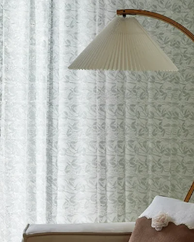 Willow Whisper Curtain with floor lamp in cozy bedroom corner.
