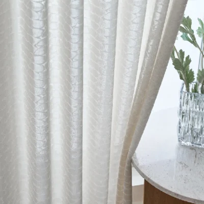 Close-up of Echo Leaf Curtain with jacquard texture beside a round table and vase