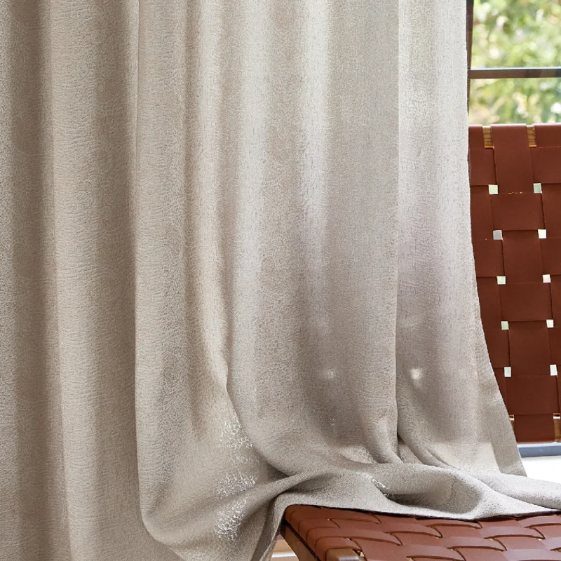 Close-up of dune-inspired textured jacquard curtain with elegant drape