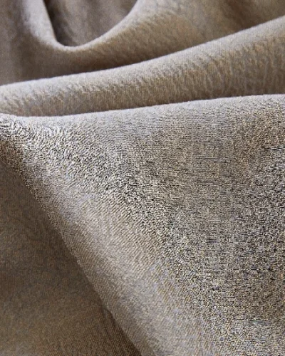 Close-up of soft jacquard curtain fabric with matte textured finish