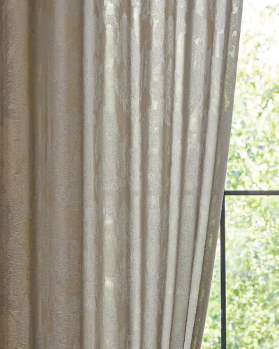 Close-up of dual veil jacquard curtain with layered sheer texture and soft light
